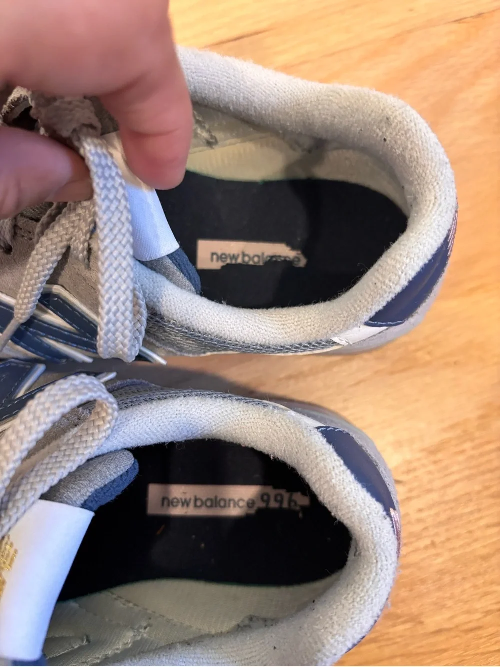 New Balance 996 sneakers in a grey, blue, and pink colorway size 6.5